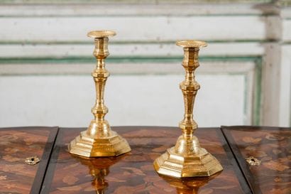 Pair of chased and gilded bronze torches...