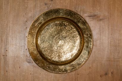 Chased brass offering dish decorated with...