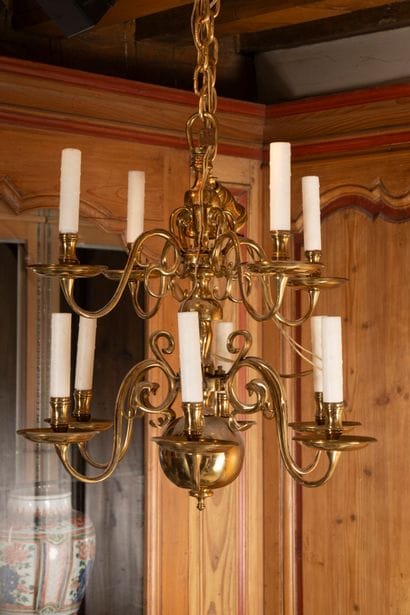 Pair of ten-light brass chandeliers

Holland....