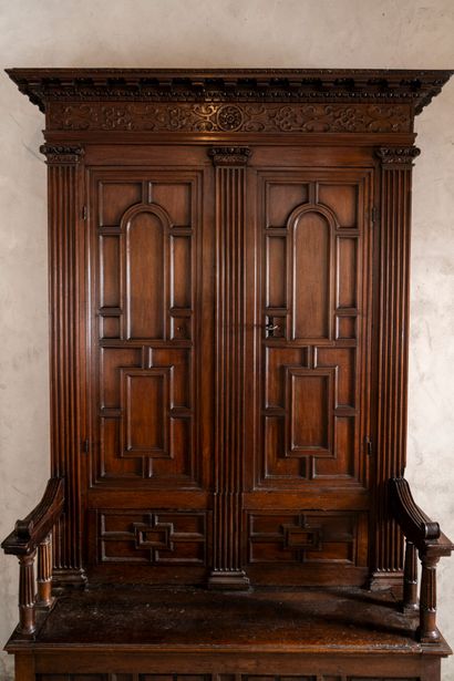 Moulded and carved walnut double cabinet...