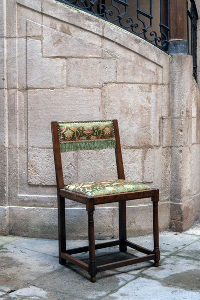 Pair of low-back walnut chairs turned with...