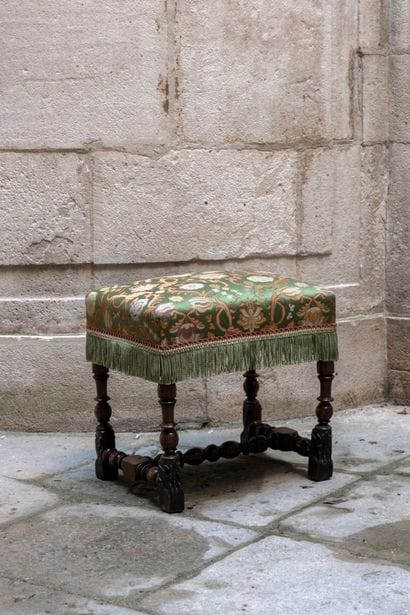 Walnut wood stool with turned legs joined...