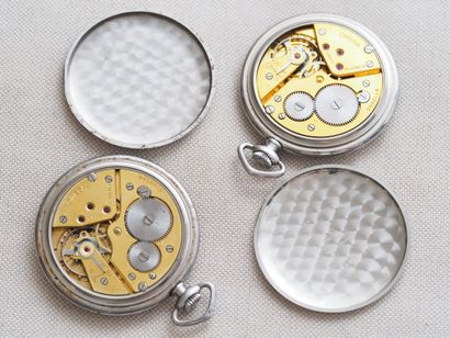 OMEGA
Reunion of two steel pocket watches:...