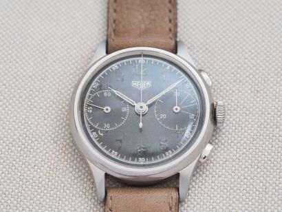 HEUER Chrono
Case: Steel. Round. Press stud...
