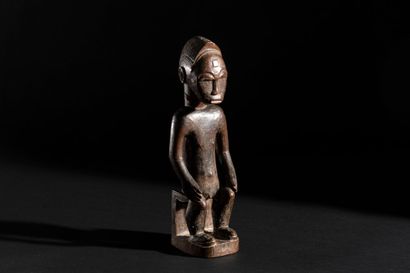 Baule, Ivory Coast
Seated male statuette...