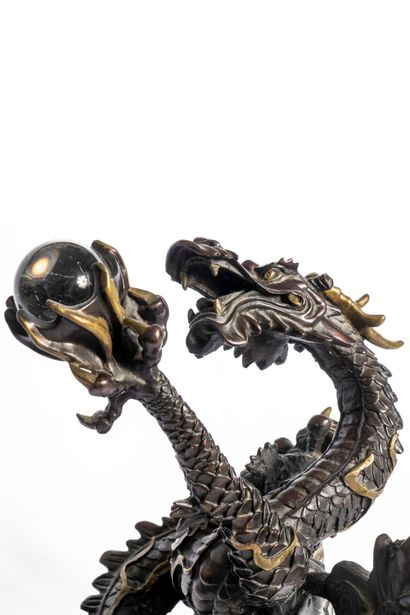 Japan. Meiji period 
Red-brown patina bronze...