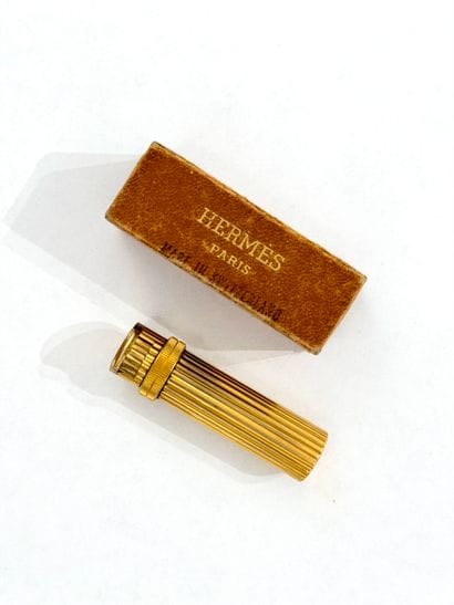 HERMÈS Paris
Cylindrical lighter made of...