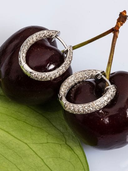 Pair of 18k white gold (750e) hoop earrings,...
