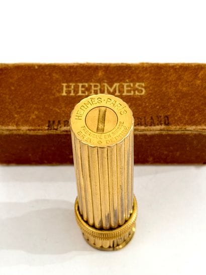 HERMÈS Paris
Cylindrical lighter made of...