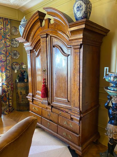 Two-part dresser with an upper part opening...