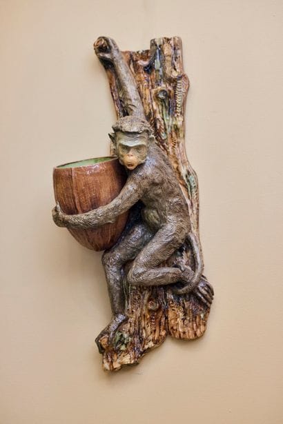 Large wall sconce in barbotine depicting...