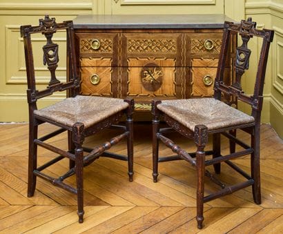 Pair of chairs in molded natural wood, the...