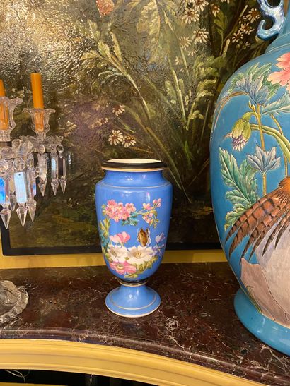 Pair of porcelain vases on pedestal with...