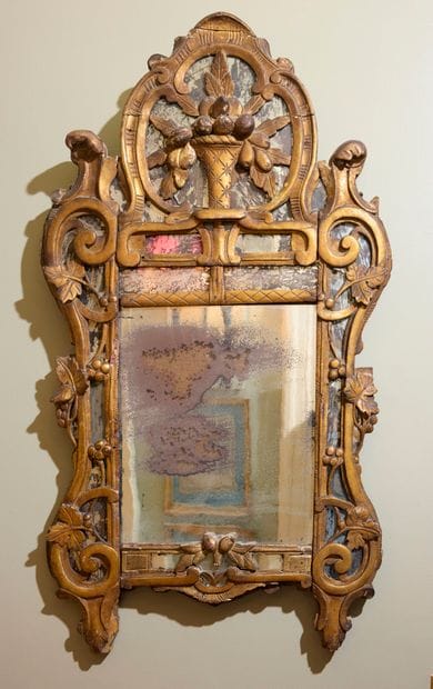 Molded, carved and gilded wood window with...