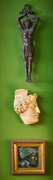 Blue glazed ceramic head of a woman in profile...