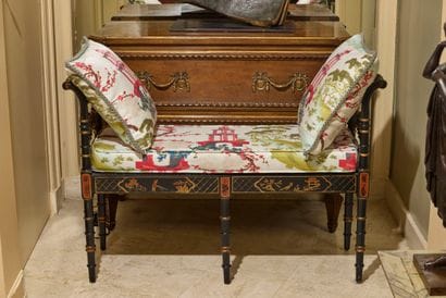 Black painted wood bench with armrests, decorated...