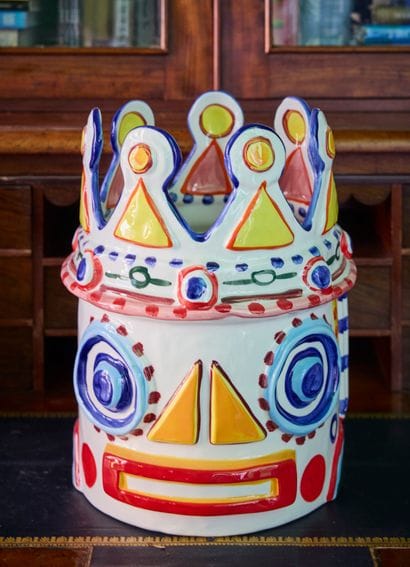 Polychrome painted ceramic planter in the...