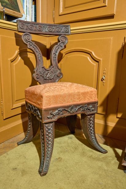 Loveseat chair in molded and carved natural...