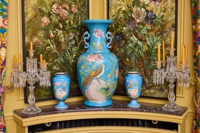 Pair of porcelain vases on pedestal with...