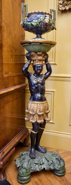Carved and painted polychrome wood saddle...