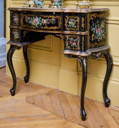 Lady's black lacquer desk painted with a...