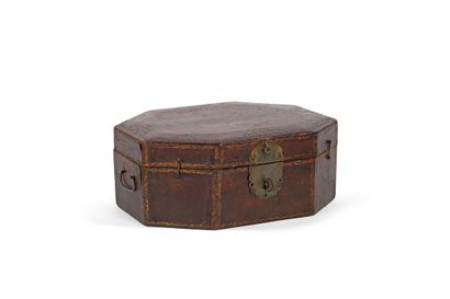 Octagonal wig box covered in red leather....