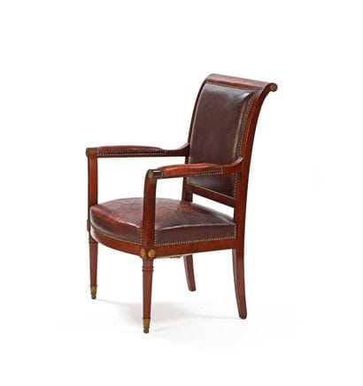 Mahogany armchair with a curved back, round...