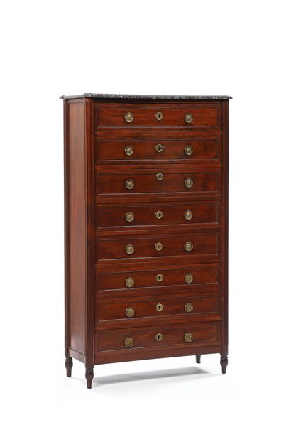 A secretary desk in the style of a mahogany...