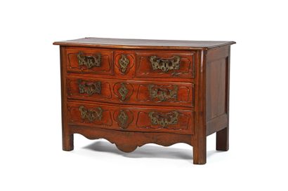 Rustic chest of drawers with a curved front,...