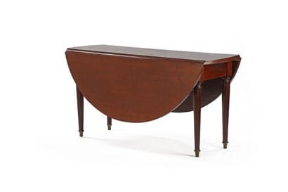 Mahogany dining table with tapered, fluted...