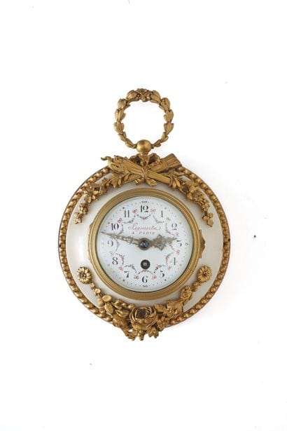 Louis XVI-style medallion-shaped table clock,...