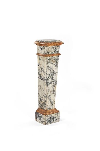 Polychrome marble column with a saddle-shaped...