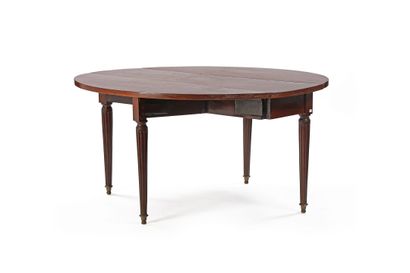 Mahogany dining table with tapered, fluted...