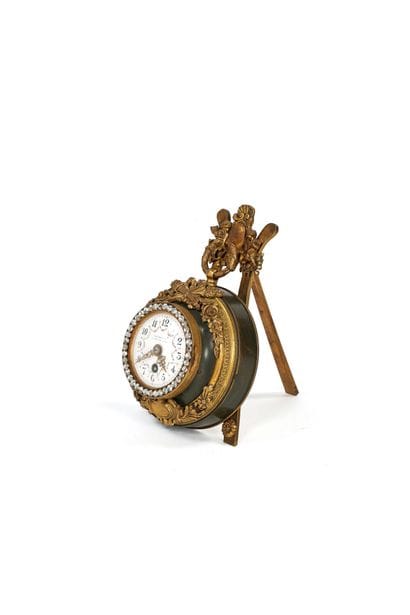 Louis XVI-style table clock with a stand,...