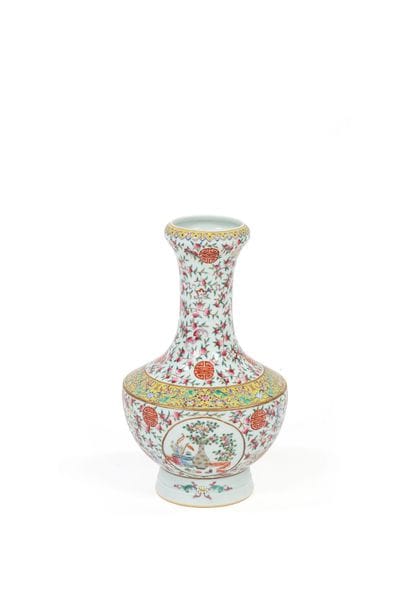 Long-necked vase with polychrome floral decoration.
China....