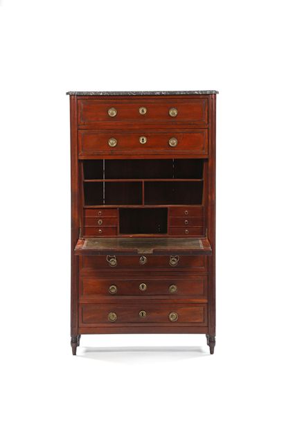 A secretary desk in the style of a mahogany...