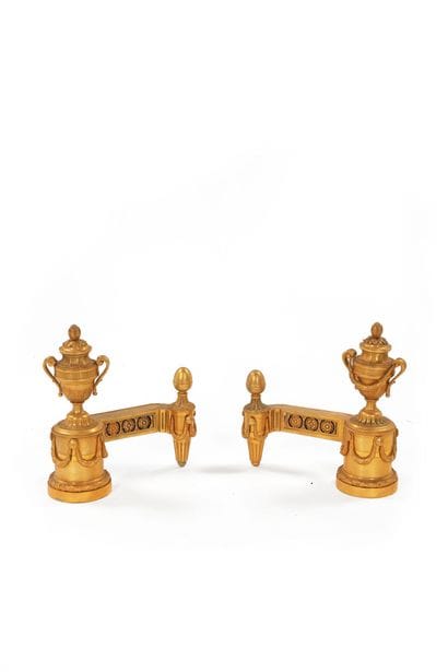 A significant pair of chiselled and gilded...