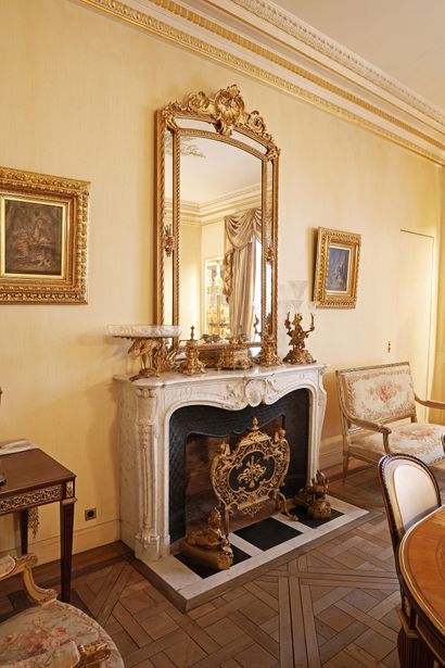 Mirror with wooden glazing beads and gilded...