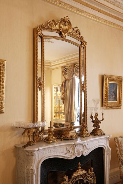 Mirror with wooden glazing beads and gilded...