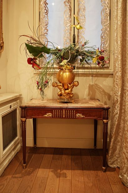 Gilded bronze vase decorated with three tritons,...
