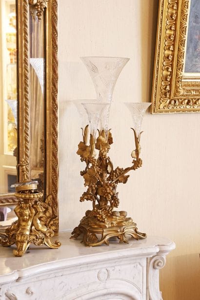 A gilded bronze group decorated with vine...