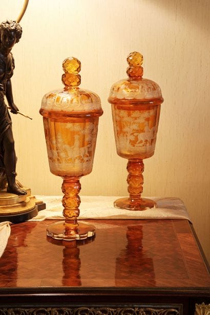 Pair of lidded vases on pedestals, made of...