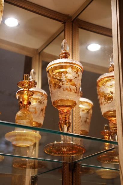 Pair of lidded vases on pedestals, made of...