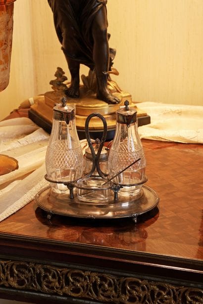 Silver tableware set including: 
- A cut-glass...