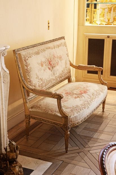 A carved and gilded wooden living room set...