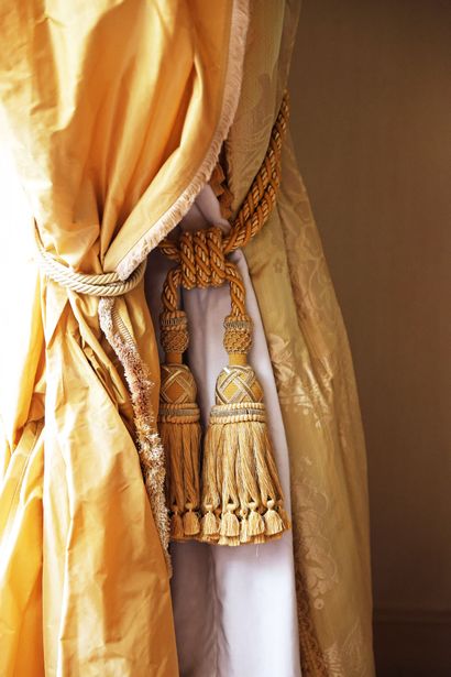 Pair of green silk curtains and a drapery...