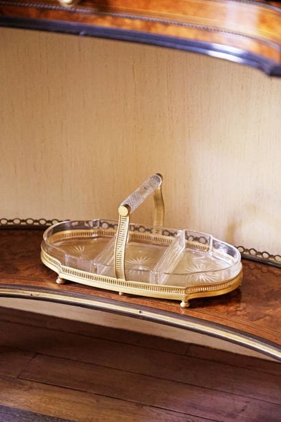 Display case with a gilded bronze frame and...