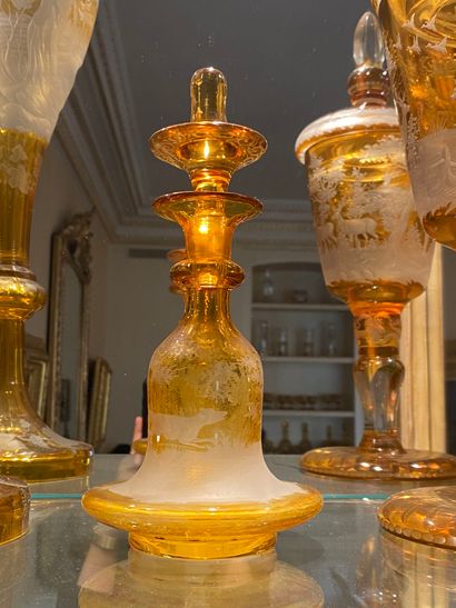 Pair of tinted, cut Bohemian crystal decanters...