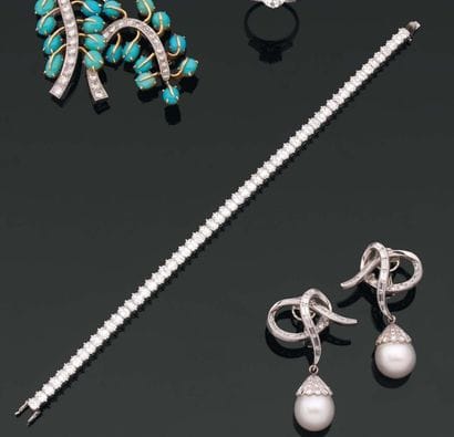 MAUBOUSSIN. Années 1970. BRACELET ligne composé...