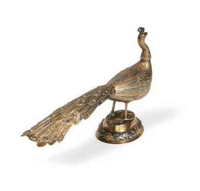 PAON en argent en partie doré. Corps et longue...